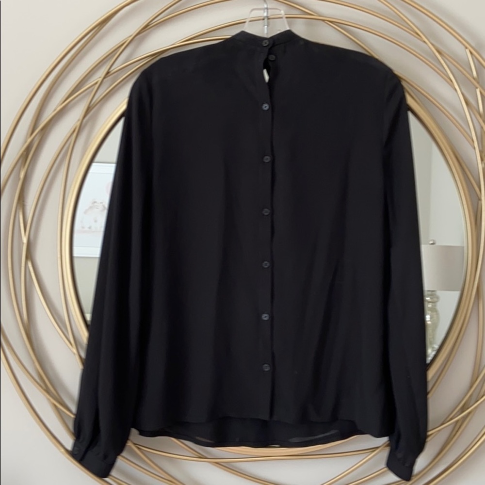 Express button back long sleeve blouse